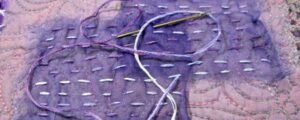 Creative sewing in shades of purple: a little handstitching