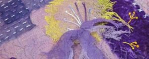 Creative sewing in shades of purple: Dandelion emerges